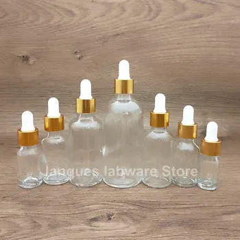 10tk 5 ml kuni 100 ml läbipaistvast Klaasist Pudel Tilguti golden keeratav kork eeterlik õli viaali pipeti abil Korduvtäidetavaid Pudelid